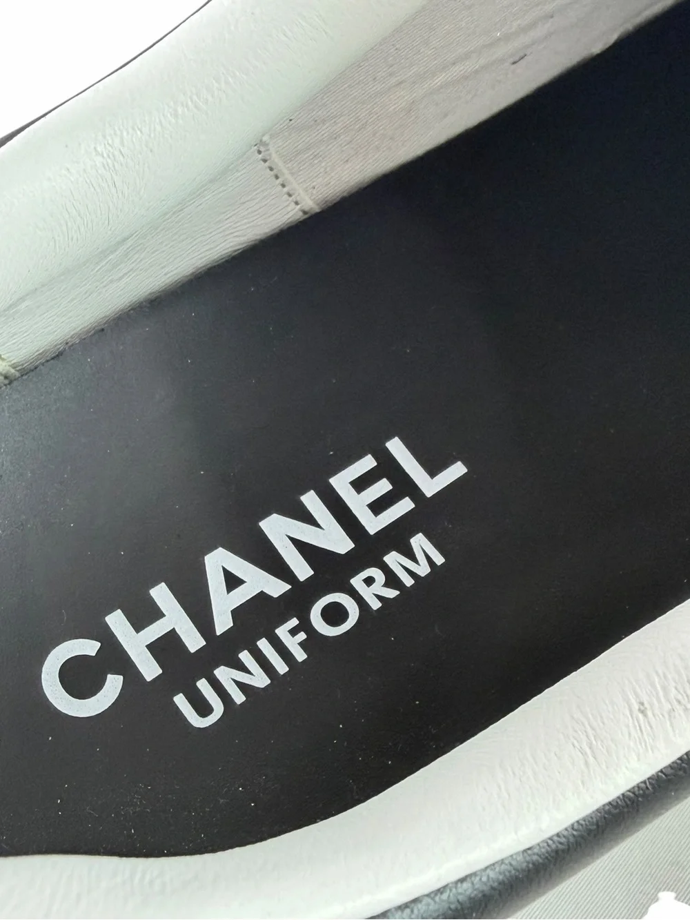CHANEL Uniform Black Leather Low Top Unisex Sneakers Marked as 42 - W 11 - M 9